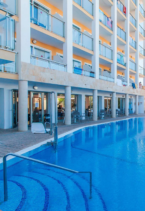 Swimming pool at night Main swimming pool of the Bella Mar Hotel illuminated at night